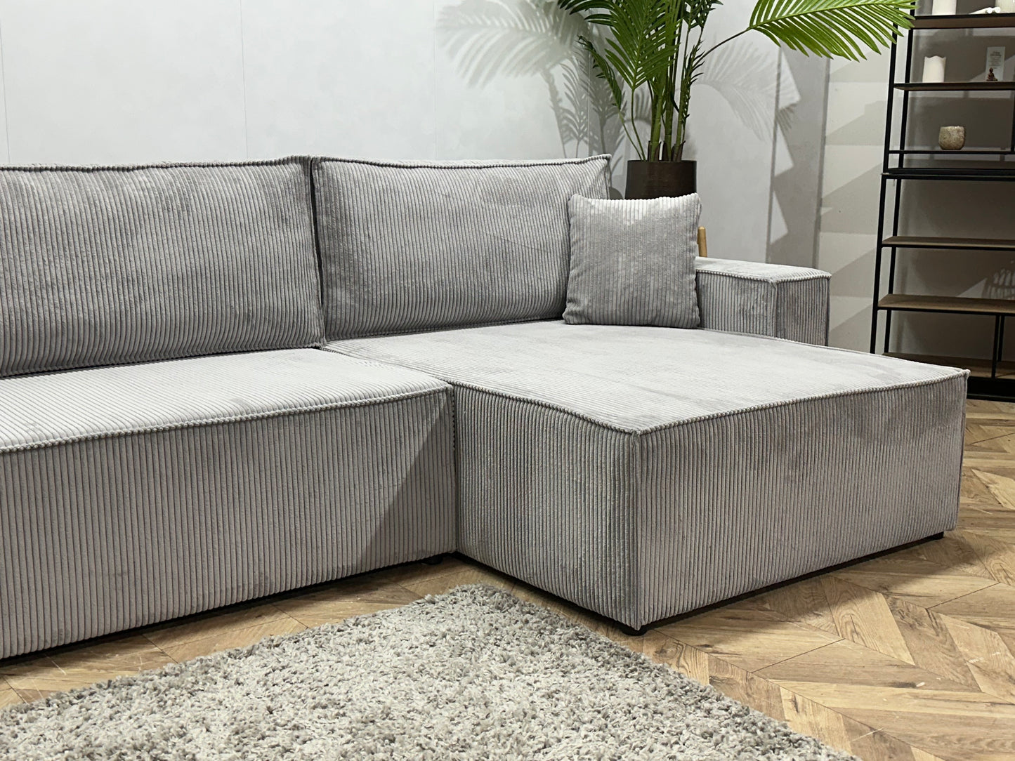 !Showroommodel! Licht Grijze Ribstof Hoekbank