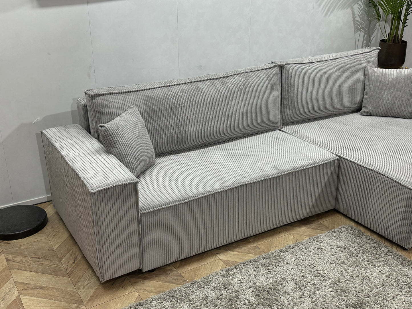 !Showroommodel! Licht Grijze Ribstof Hoekbank