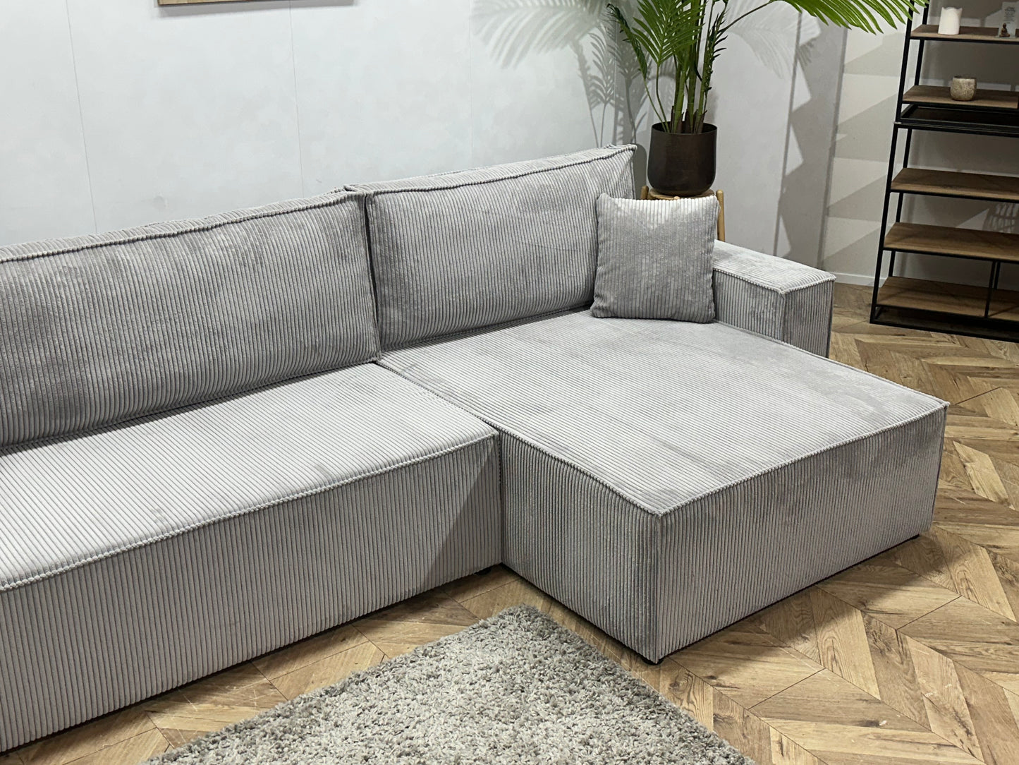 !Showroommodel! Licht Grijze Ribstof Hoekbank
