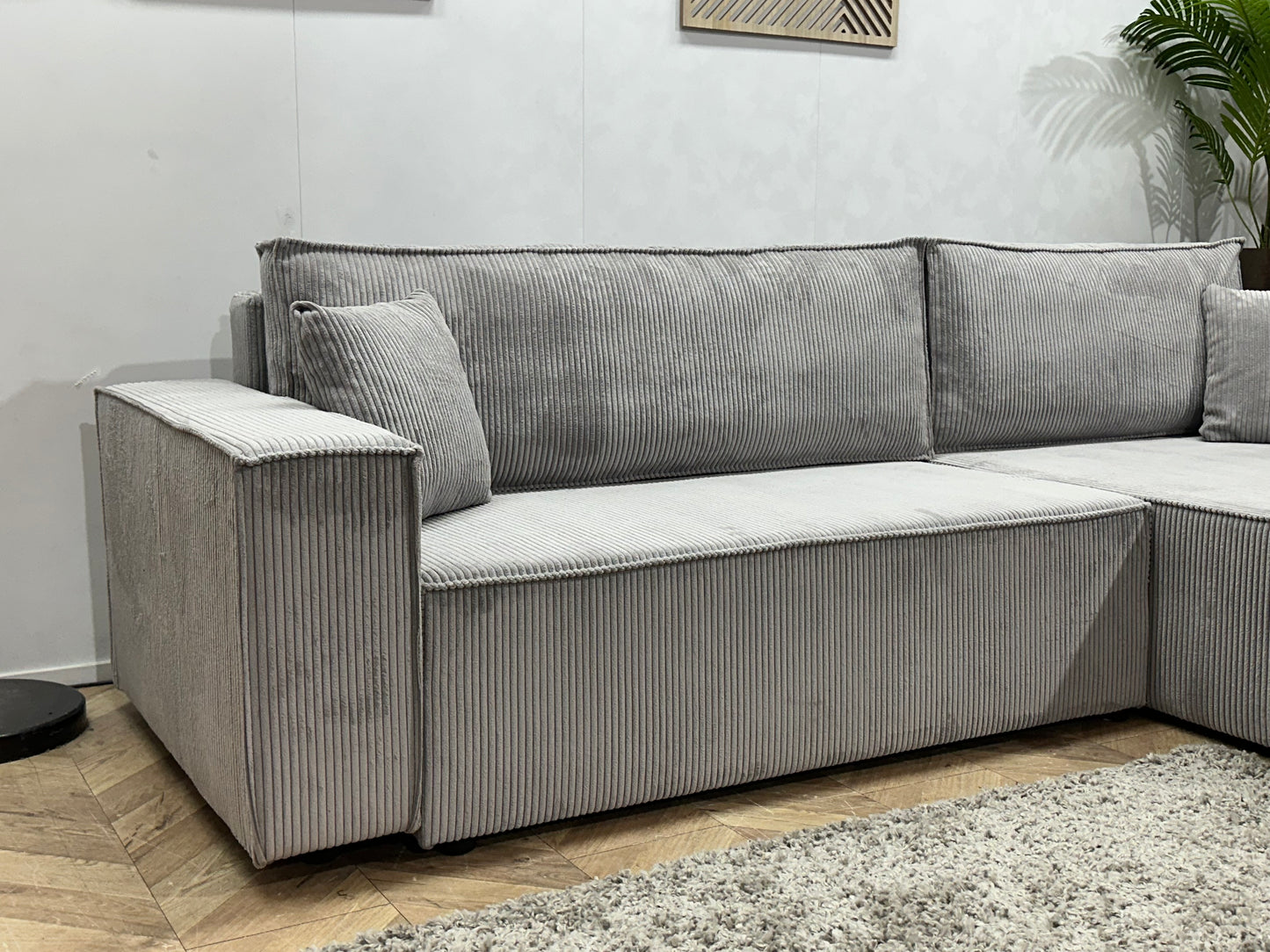 !Showroommodel! Licht Grijze Ribstof Hoekbank